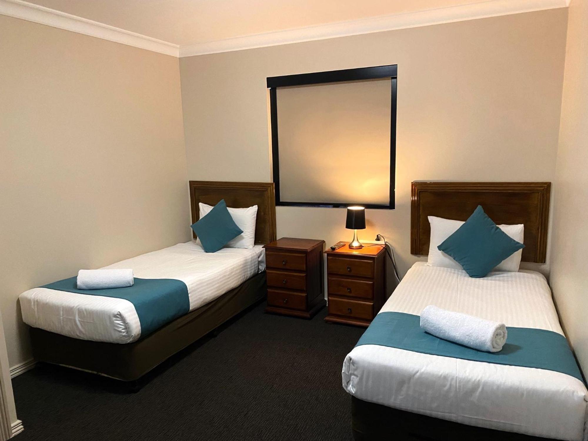 City Ville Apartments And Motel Rockhampton Quarto foto
